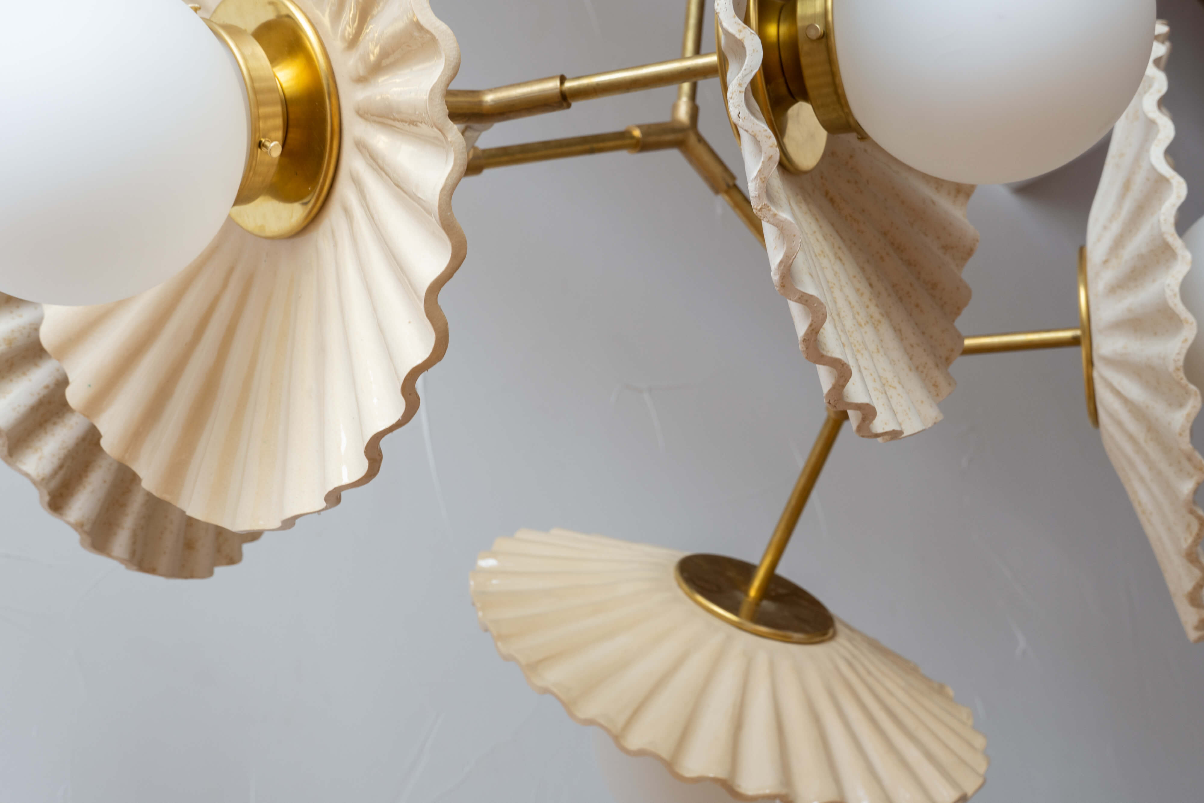 Side and detail view of the Speckled Cream Estella Chandelier